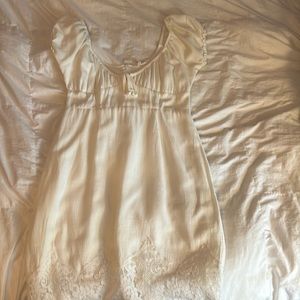 Woman’s white mini dress